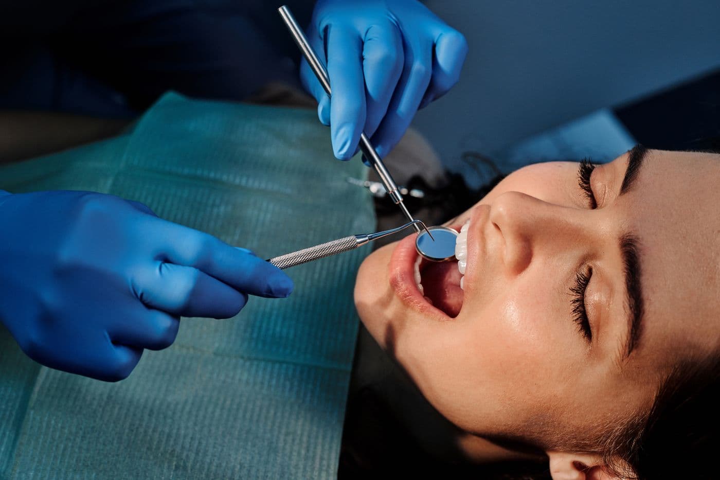 Close view of a dental check with a small mirror